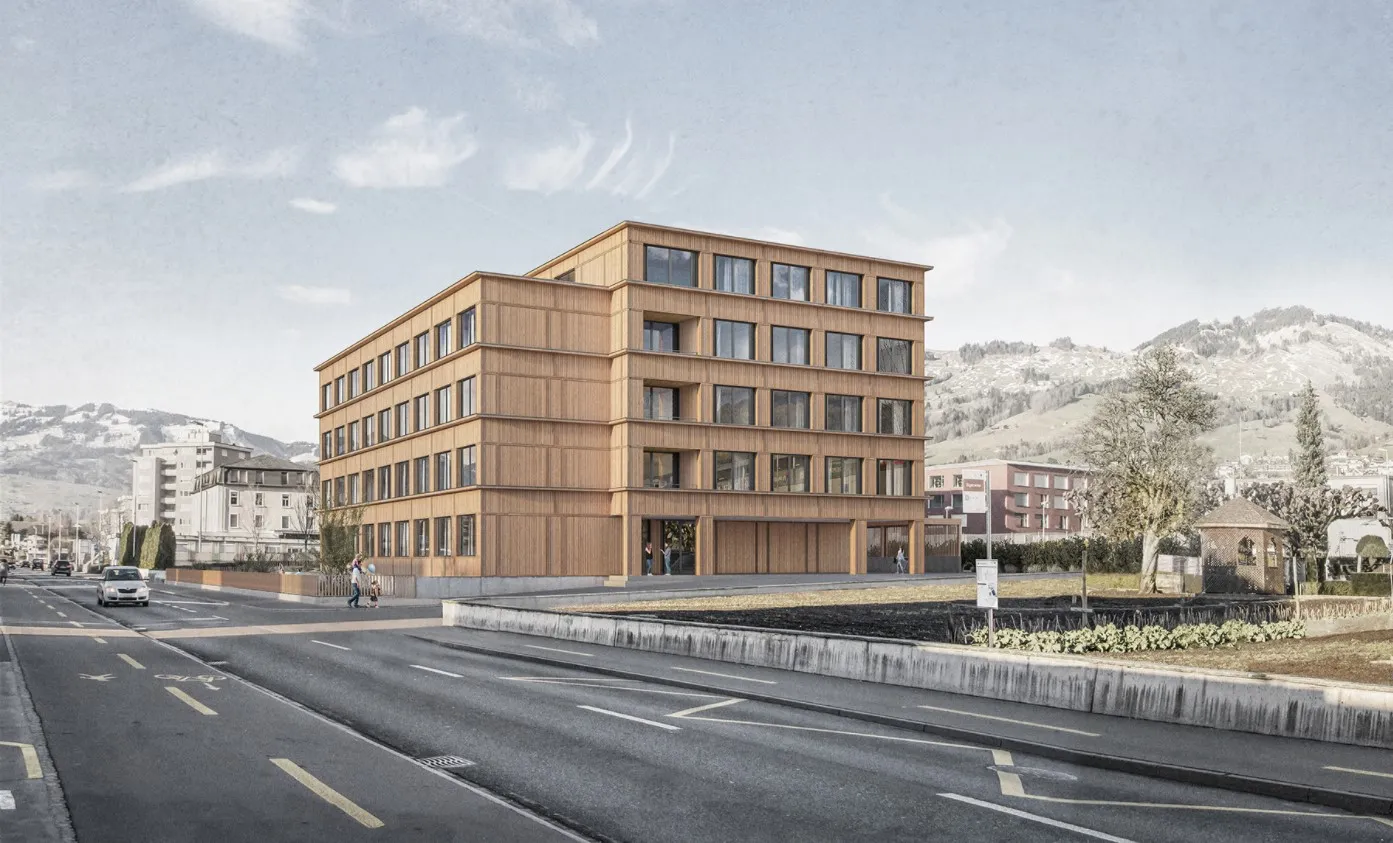 Gebäude mit Hügeln im Hintergrund