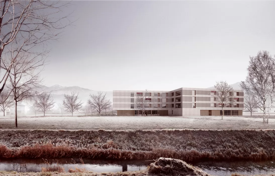 Wiese mit Frost und Nebel, im Hintergrund steht ein rechteckiges Geb&auml;ude