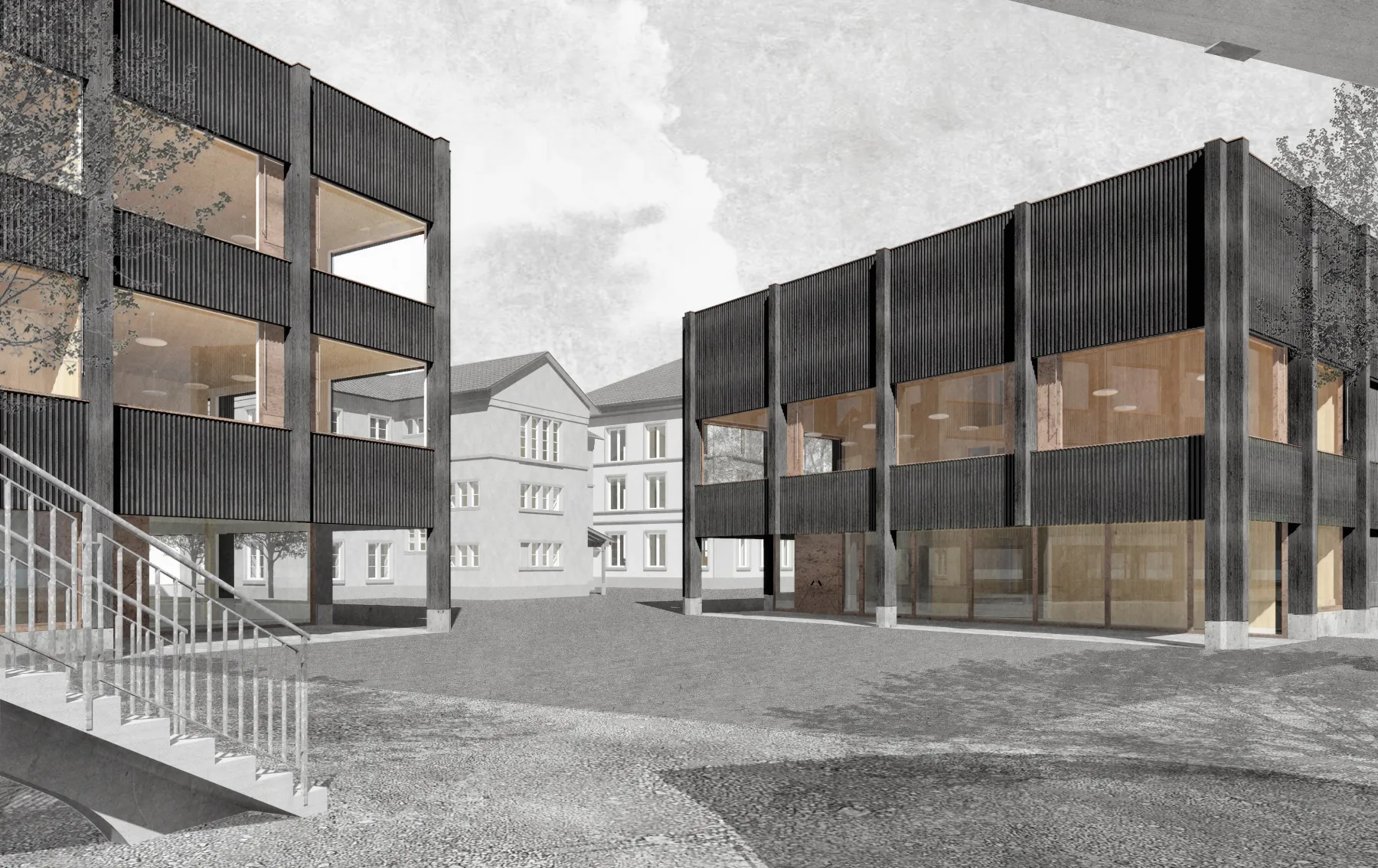 Zwei würfelähnliche Gebäude mit schwarzer Fassade