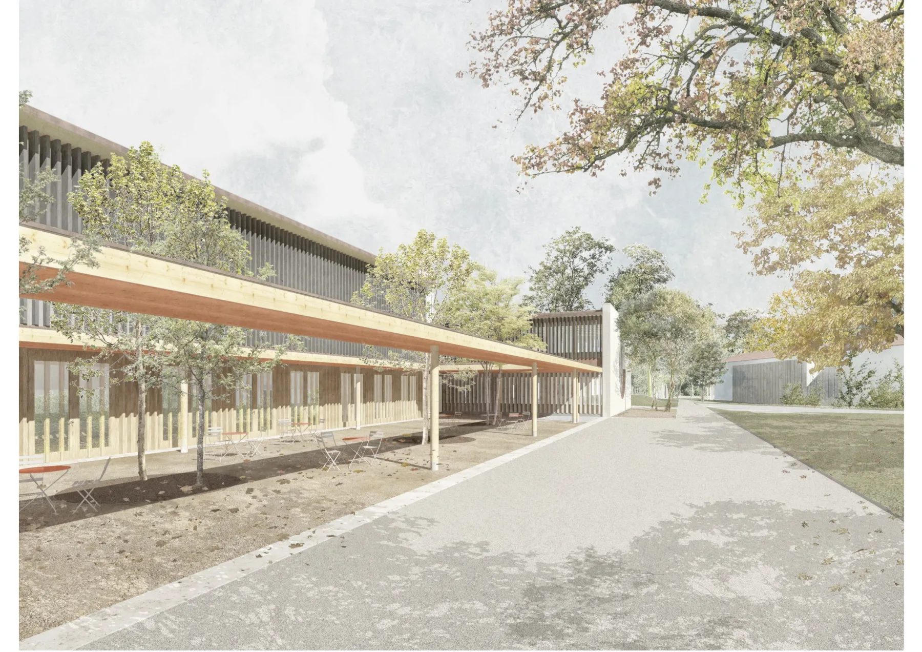 Hausfassade aus Holz mit einem Baum im Vordergrund